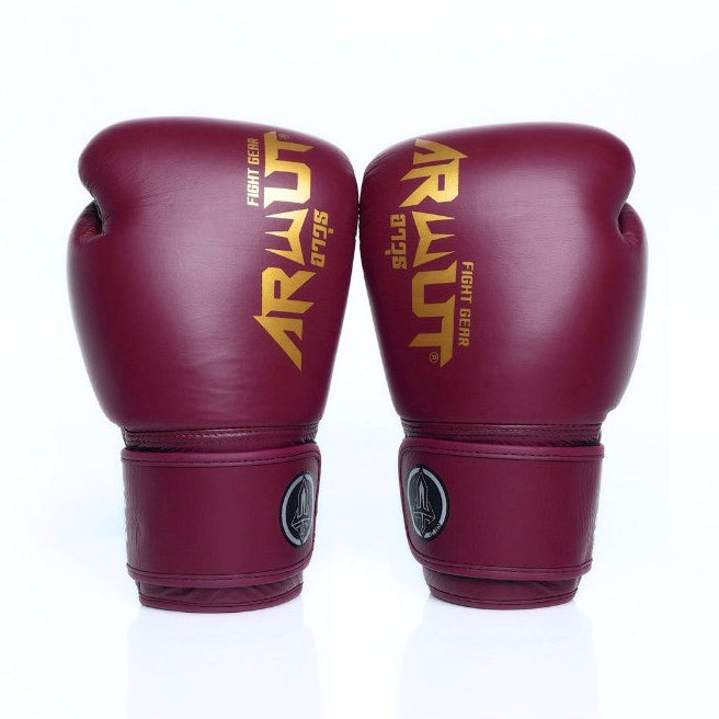 Pair of maroon boxing gloves with gold logo on a white background