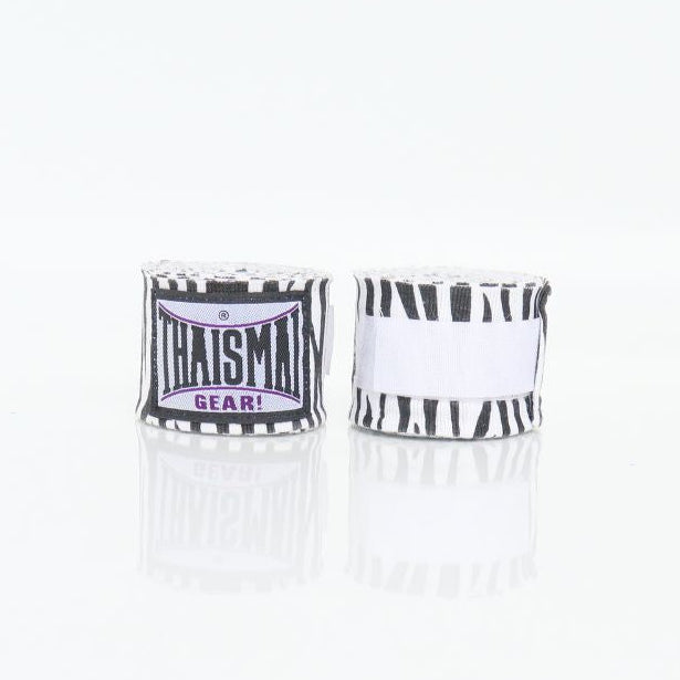 Pair of white boxing hand wraps with black and purple branding on a white background