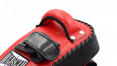 Red boxing glove with black accents on a white background