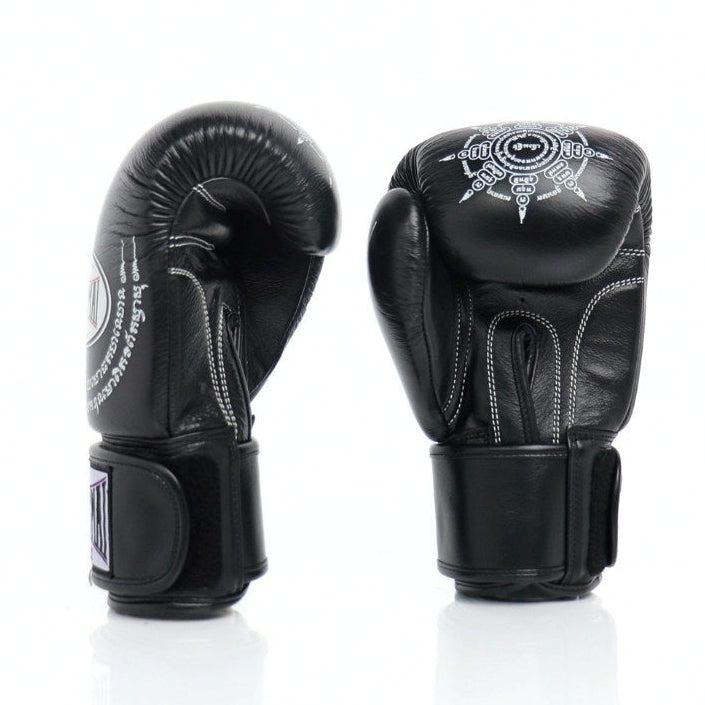 Pair of black boxing gloves with a logo on a white background