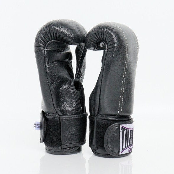 Pair of black boxing gloves on a white background