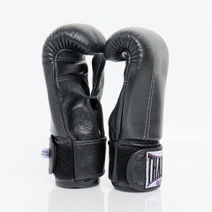 Pair of black boxing gloves on a white background