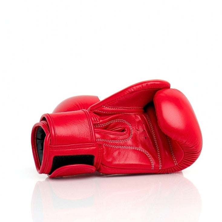 Red boxing glove on a white background