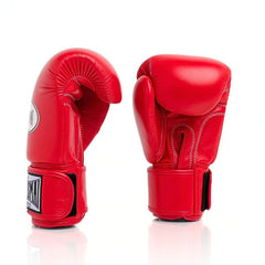 Pair of red boxing gloves on a white background