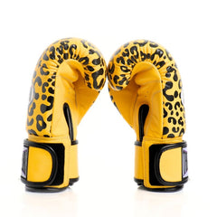 Yellow boxing gloves with leopard print pattern on a white background