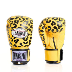 Yellow boxing gloves with black leopard print design on a white background