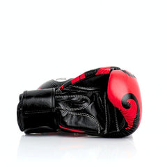 Black and red boxing glove on a white background