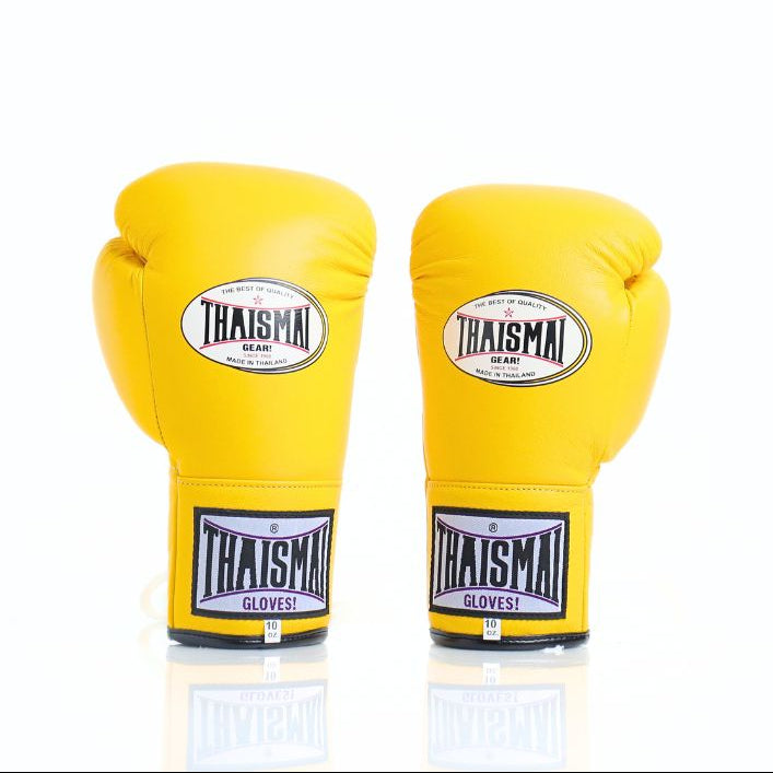 Pair of yellow boxing gloves with Thaisman branding on a white background