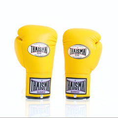 Pair of yellow boxing gloves with Thaisman branding on a white background