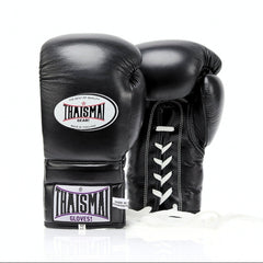 Black boxing gloves with Thaisma branding on a white background