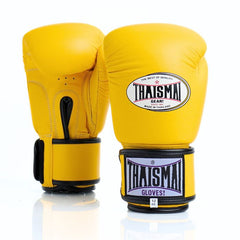 Yellow boxing gloves with Thaisma branding on a white background