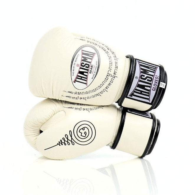 Pair of white boxing gloves with black accents on a white background