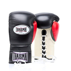 Pair of black, red, and white boxing gloves with Thaismai Gear branding on a white background.
