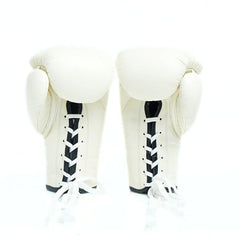 Pair of white boxing gloves with black accents on a white background