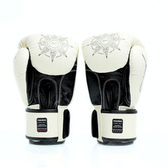 Pair of white boxing gloves with black accents on a white background