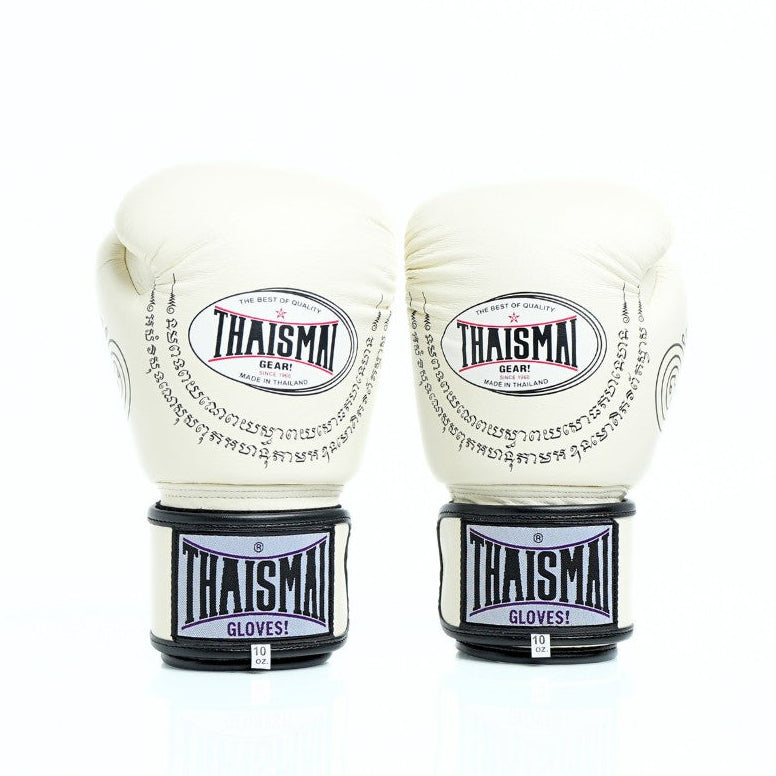 Pair of white boxing gloves with black accents and 'Thaismai' branding on a white background.