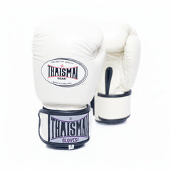 A pair of cream-colored Thaisman boxing gloves with black and white wrist wraps, displayed on a clean white background.